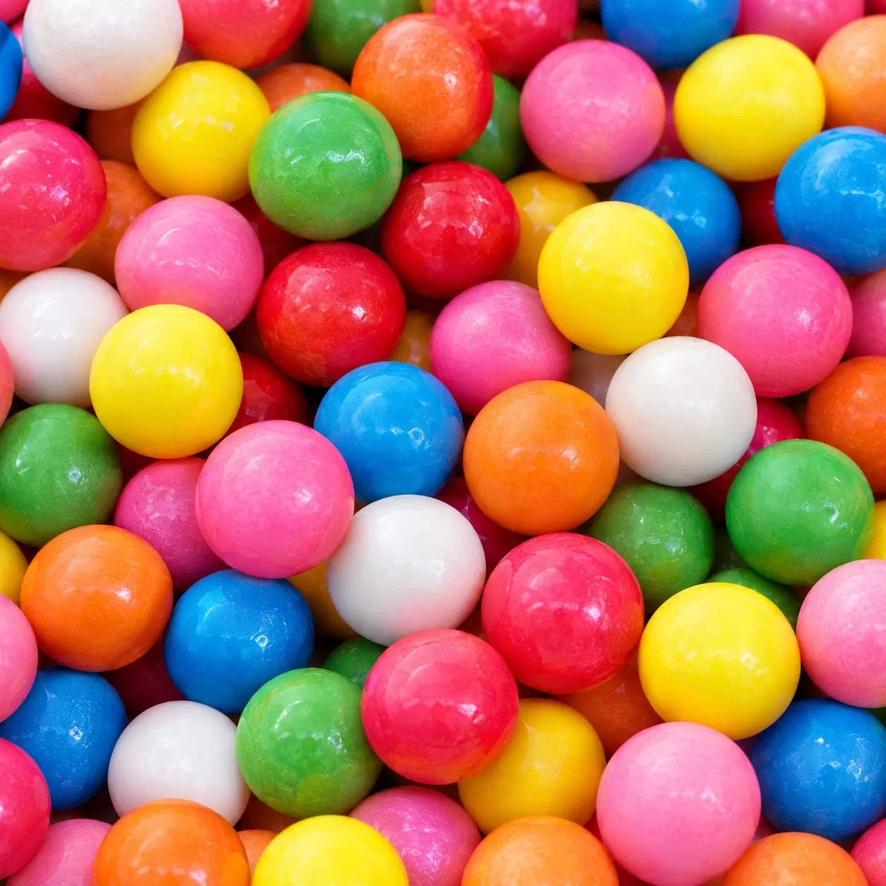 Billes de chewing-gum Vidal brillantes, roses, bleues, jaunes, vertes, orange et blanches