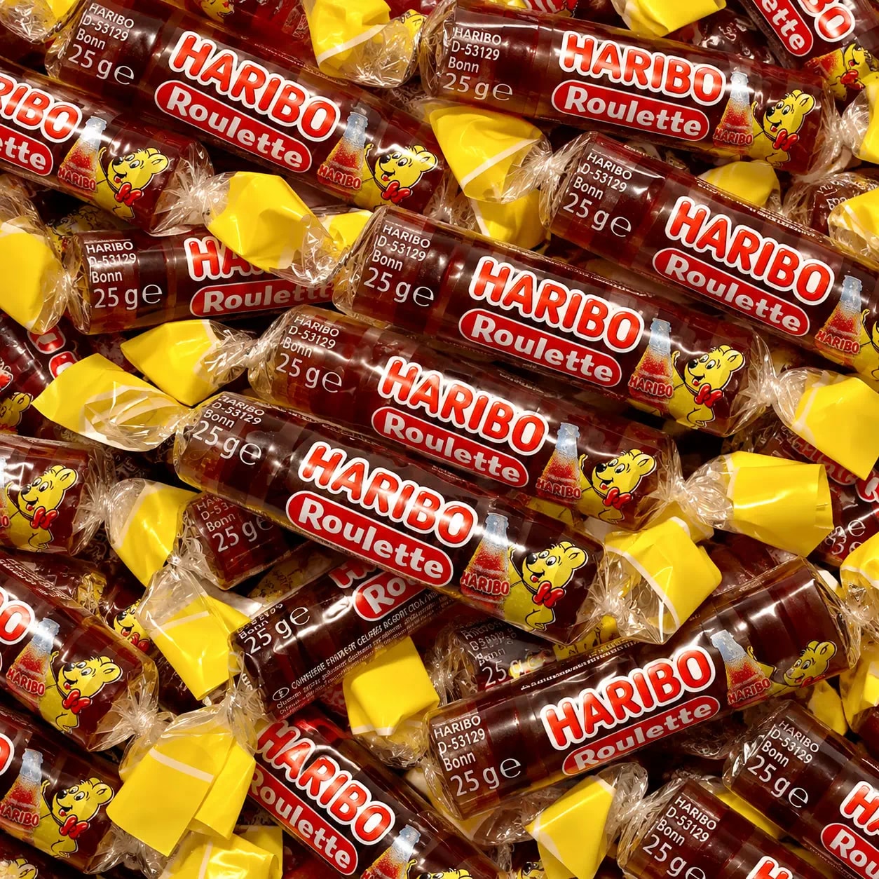 Rouleaux de pastilles gélifiées au cola dans leur papier
